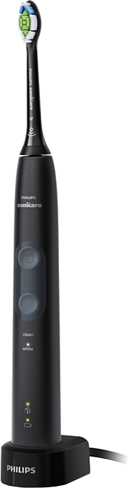 Brosse à dents électrique Philips Sonicare noire sur socle de charge.