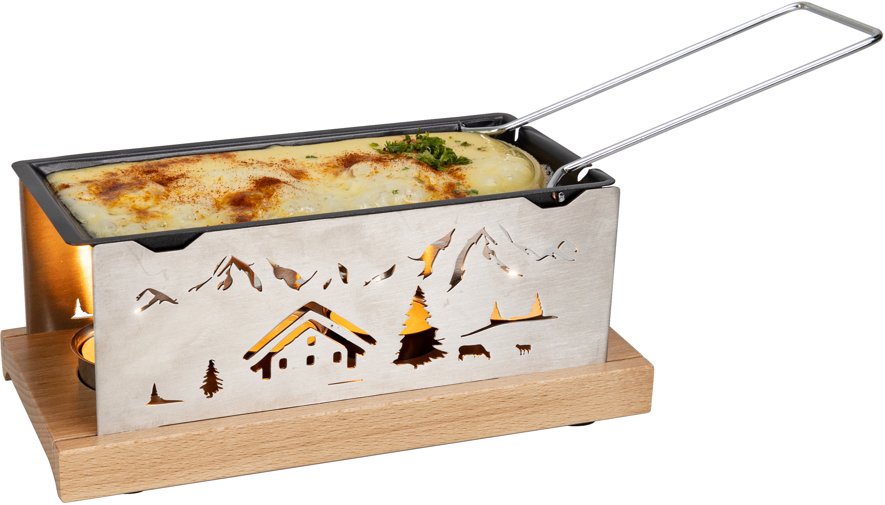 Gril à raclette avec fromage fondu, bougie et découpes de montagnes.