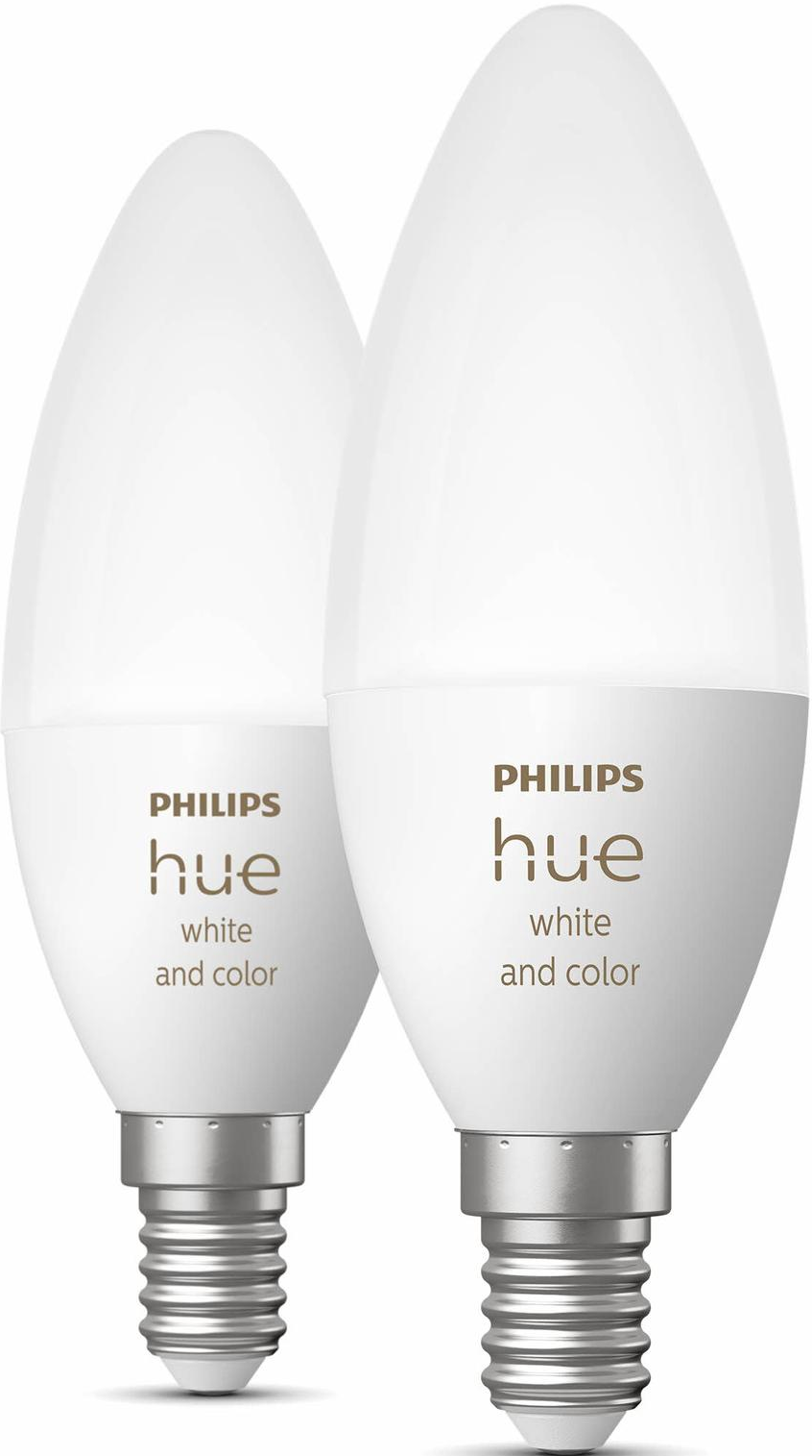 Deux ampoules blanches Philips Hue. Elles sont blanches avec une base argentée et portent le logo Philips Hue.