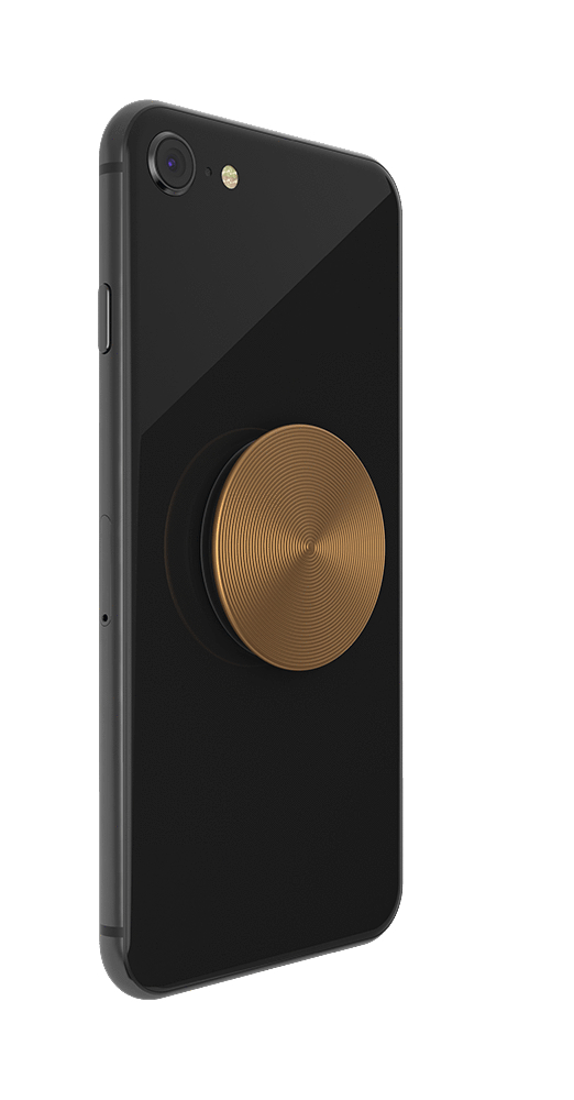 Ein schwarzes Smartphone mit einem goldfarbenen, kreisförmigen Handygriff auf der Rückseite.