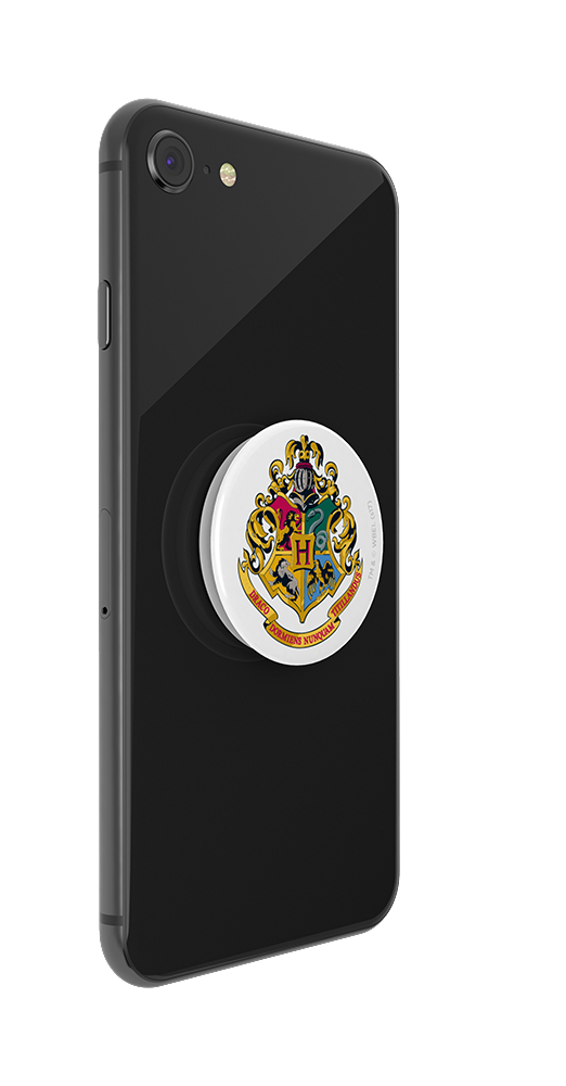 Ein schwarzes Telefon mit einem Hogwarts-Wappen-PopSocket daran befestigt.