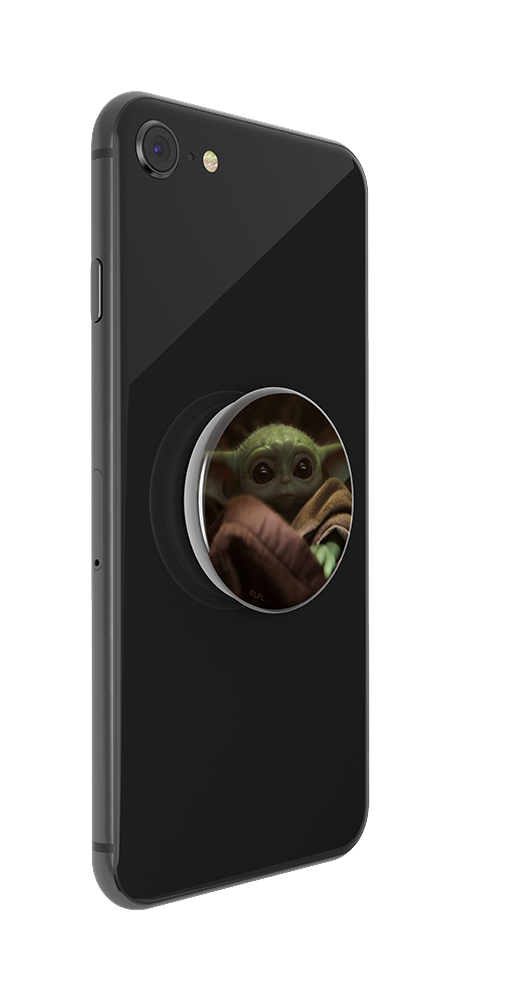 Schwarzes Telefon mit PopSocket mit Baby Yoda. Das Kind ist in einer Decke.