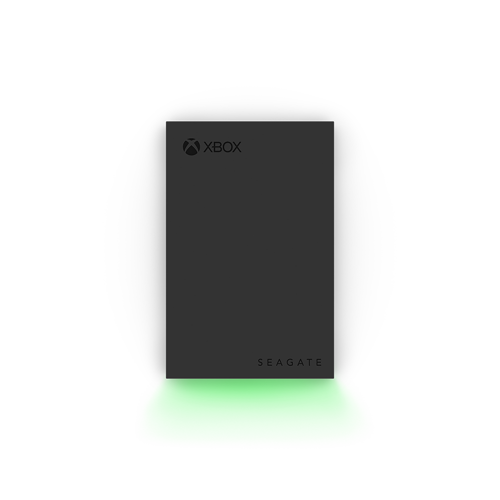 Zwarte Seagate Xbox opslag. Groene neonbasis. Xbox-logo. Zwarte achtergrond.