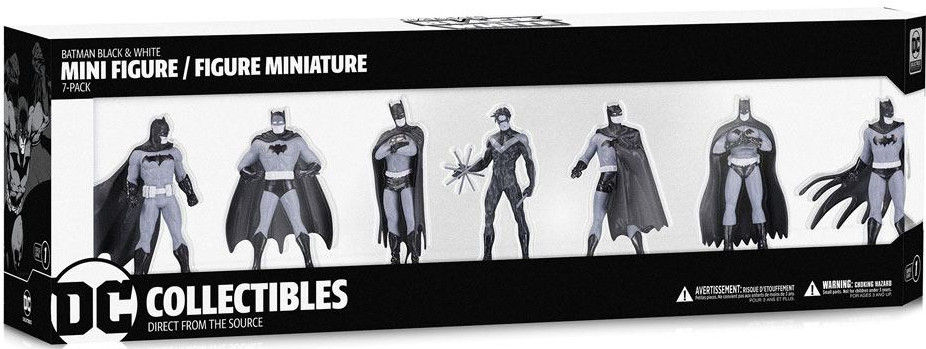 Box set of Batman figures in black and white. Multiple Batman poses are shown.