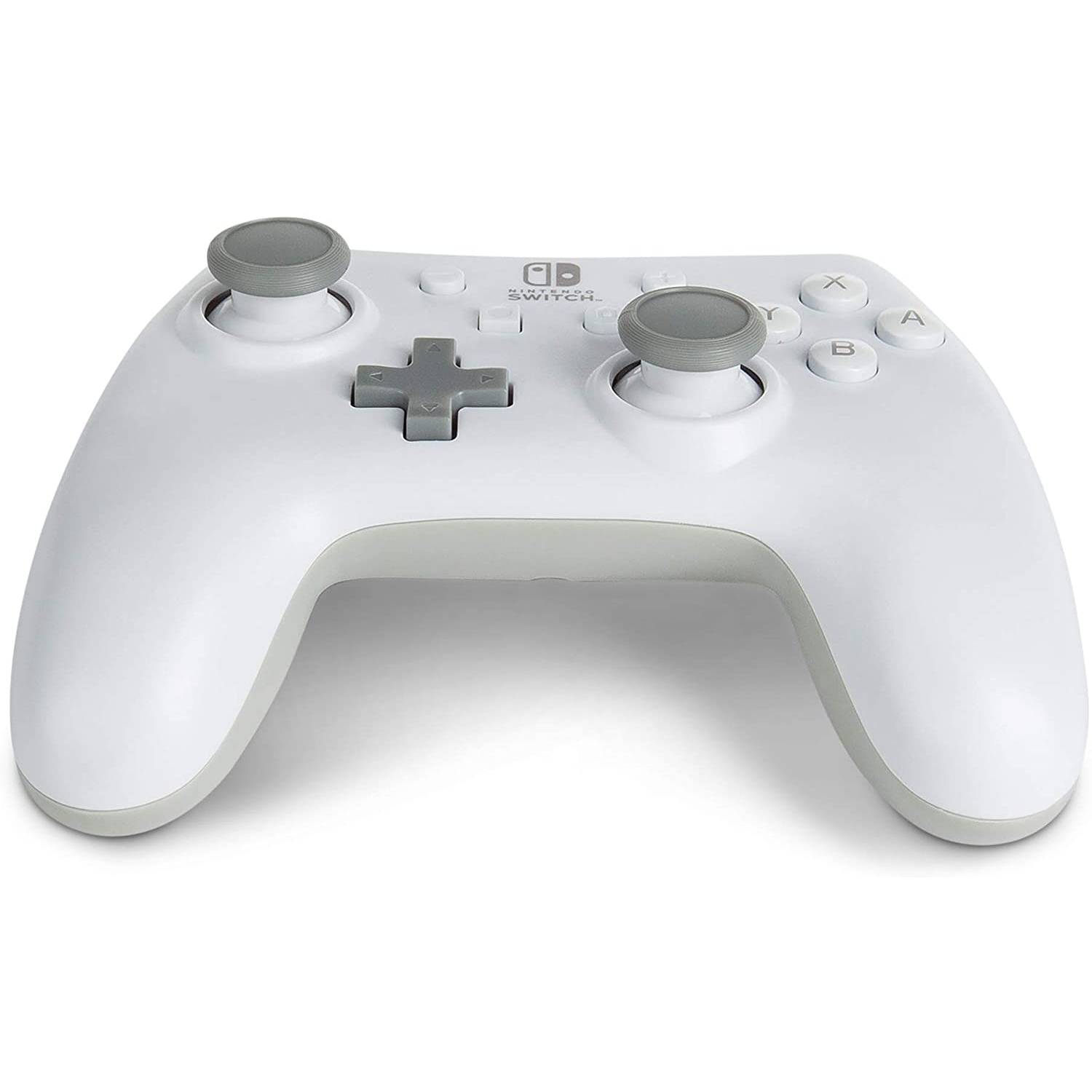 Mando blanco de Nintendo Switch. Joysticks y botones grises sobre superficie blanca.