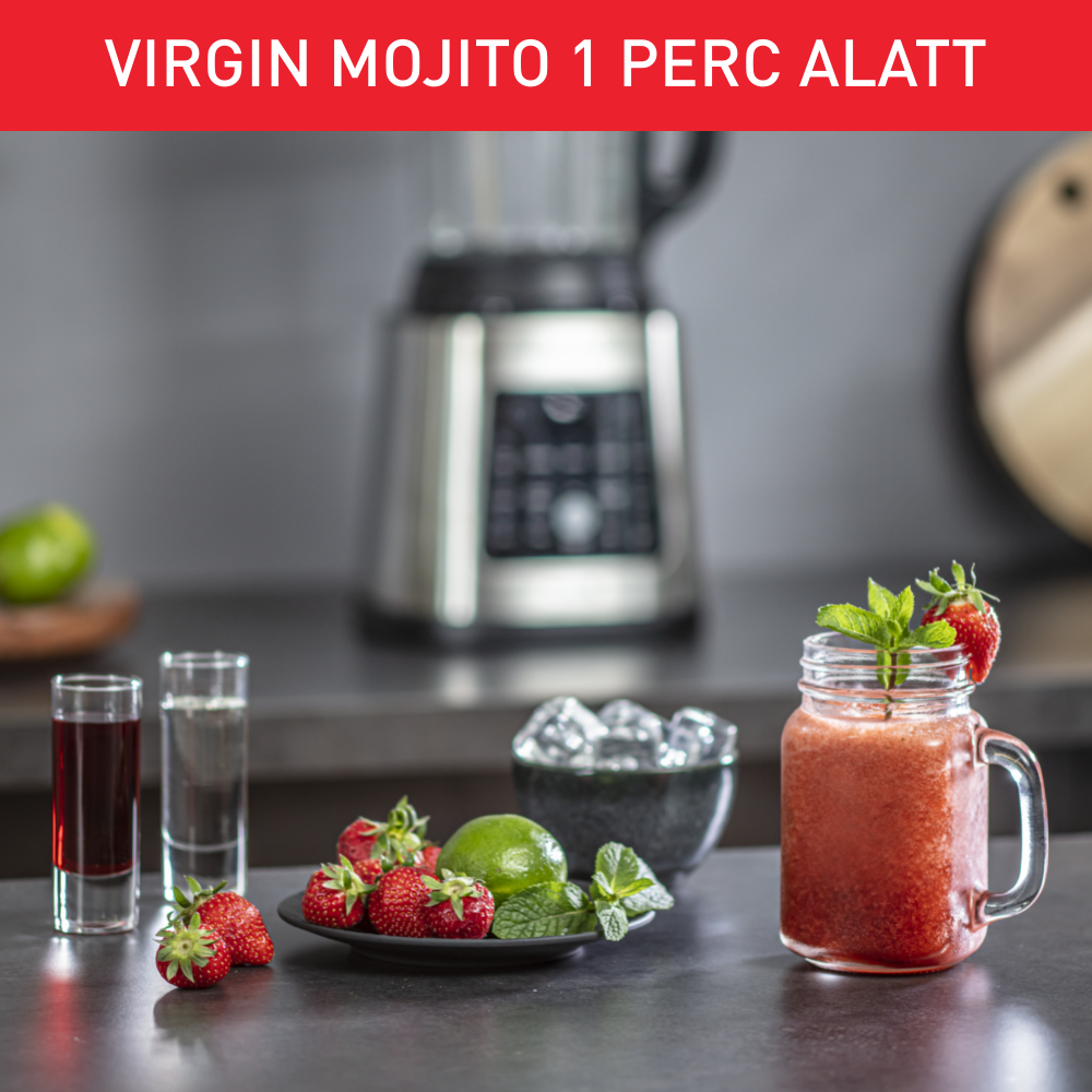 Virgin Mojito ital üvegben mentával, eperrel és egy turmixgéppel a háttérben.