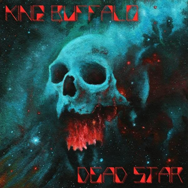 Albumcover mit einem türkisblauen Schädel vor einem Weltraumhintergrund, mit dem Wort 'DEAD STAR'.