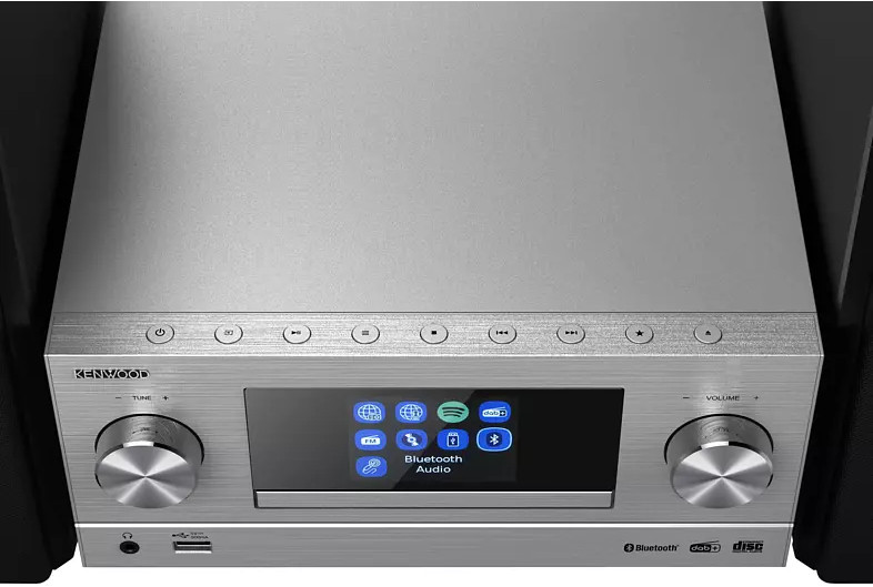 Chaîne stéréo argentée avec un écran. L'écran affiche Bluetooth Audio.