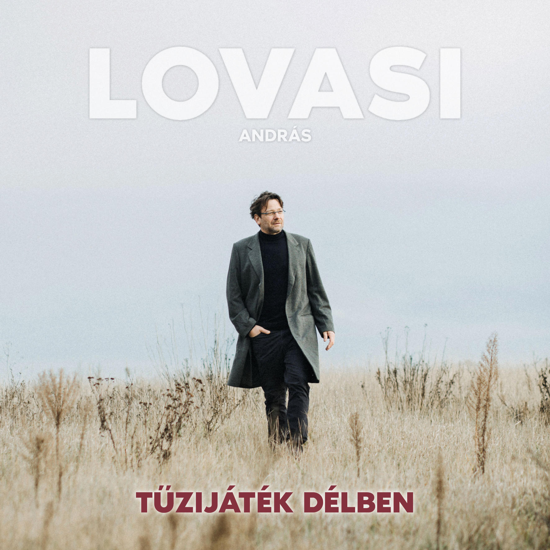 A 'Tűzijáték délben' album borítója, Lovasi Andrástól. Egy férfit mutat egy mezőn sétálva.