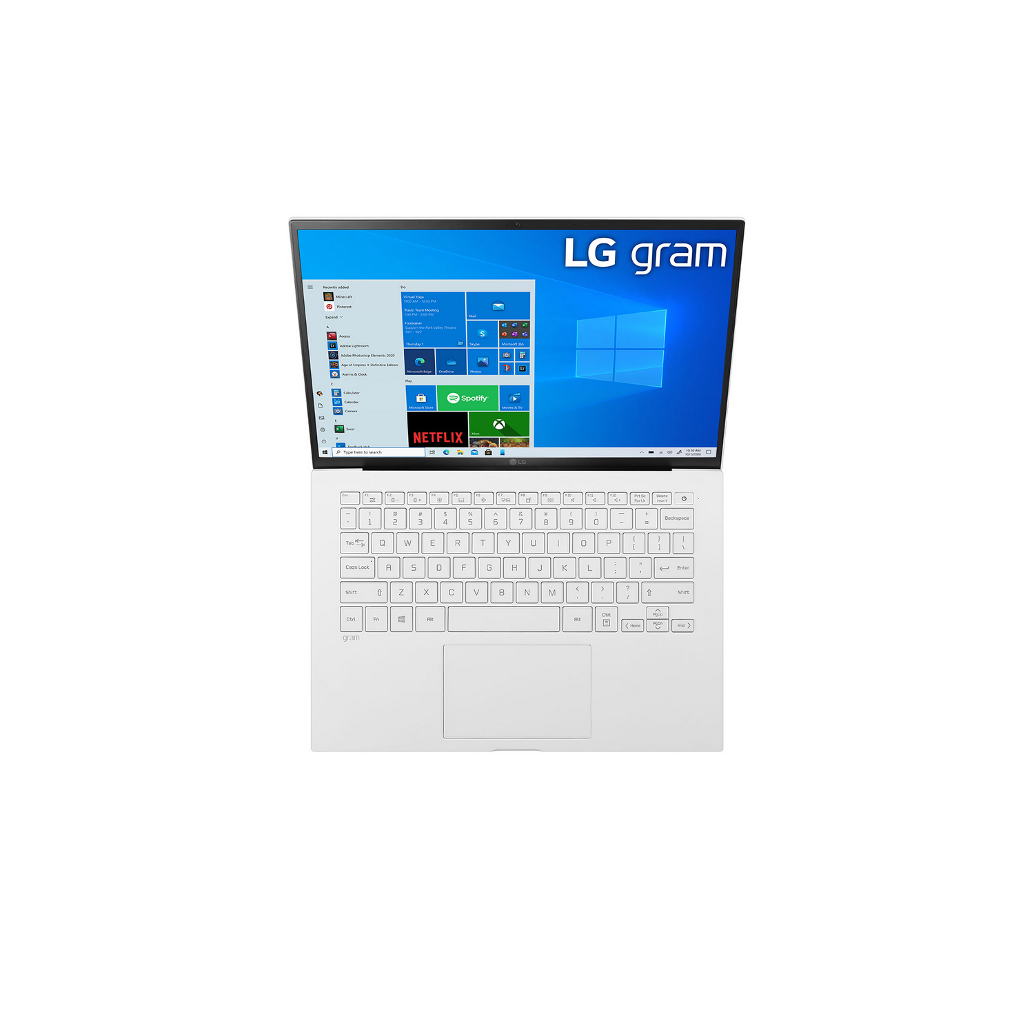 Portátil blanco abierto con la pantalla que muestra el escritorio de Windows con varios iconos de aplicaciones.