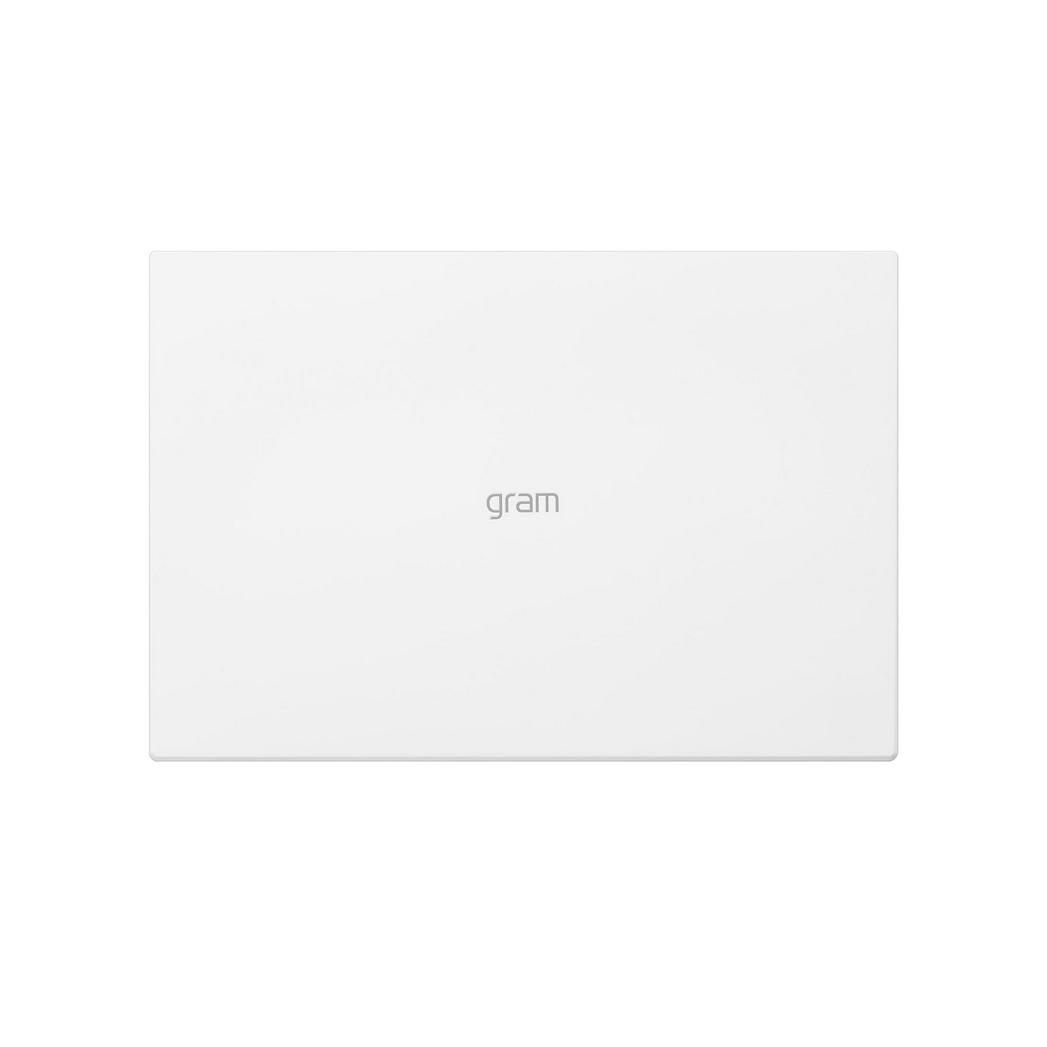 Ordenador portátil blanco, vista superior. La palabra 'gram' está en el portátil. El portátil está sobre un fondo blanco.