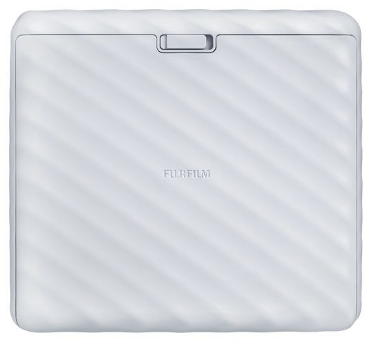 A white Fujifilm Instax Mini Link photo printer with a ridged surface.