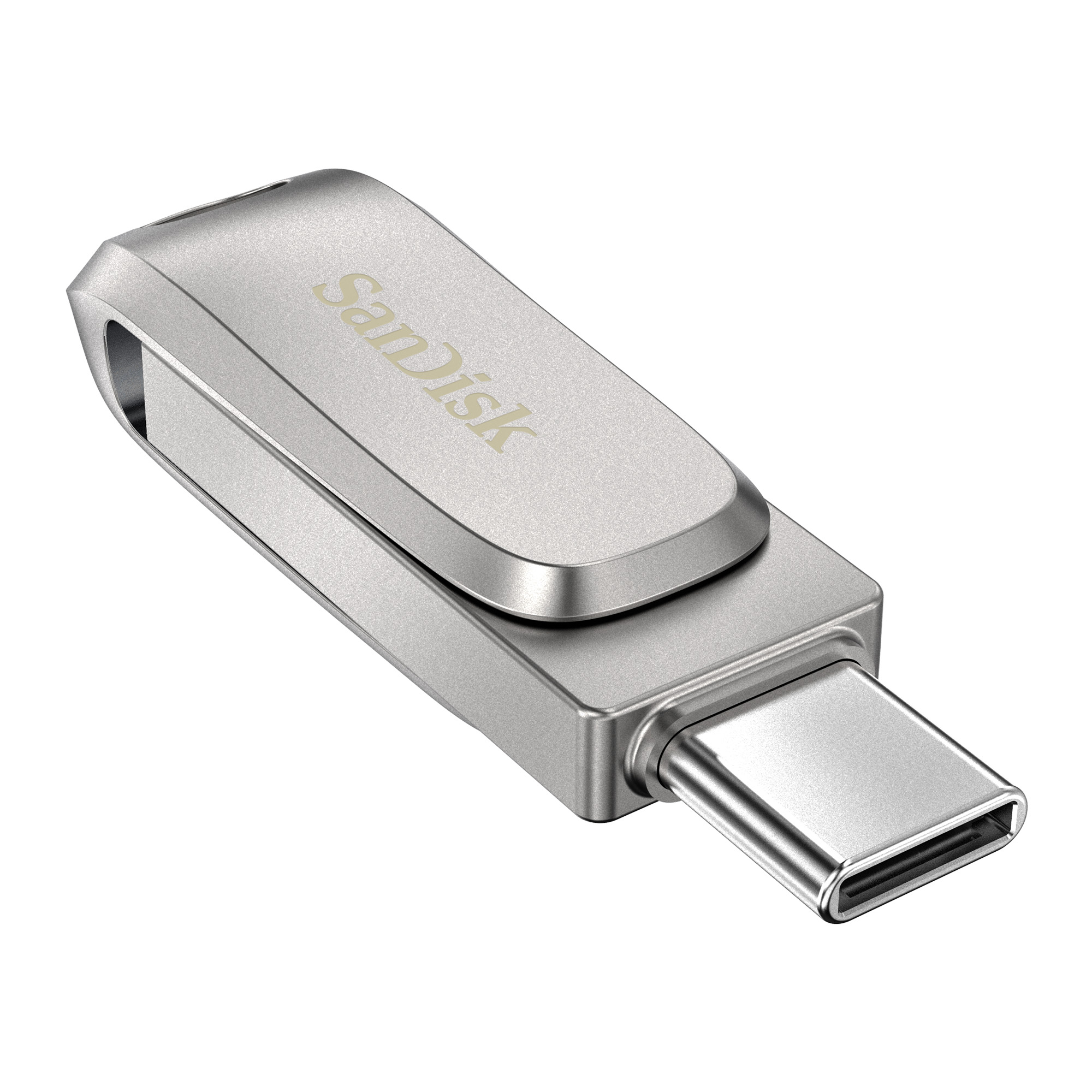 SanDisk logosu olan gümüş bir USB-C flash sürücü, beyaz bir yüzey üzerinde açılı, bağlantı noktası aşağı bakıyor.