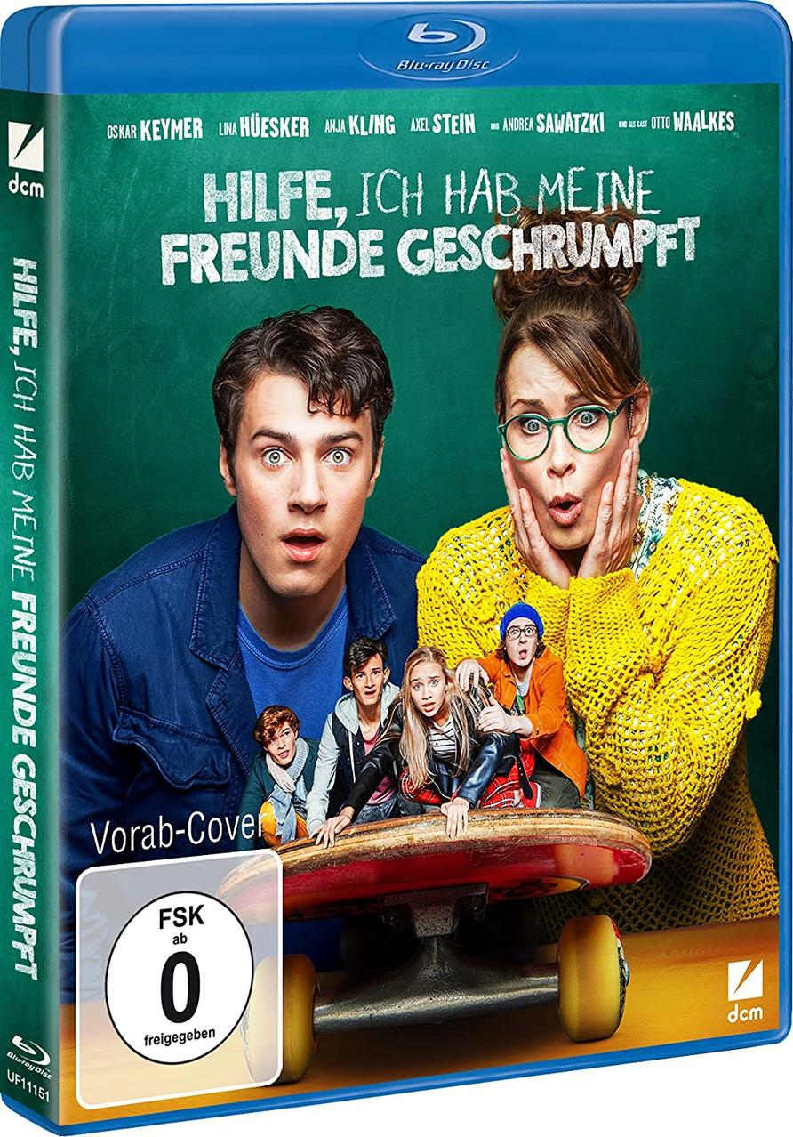 Filmcover mit einer Gruppe von Kindern und Erwachsenen, die schockiert aussehen. Blaue Disc-Verpackung.