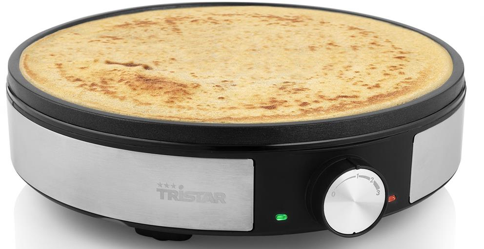 Pannenkoekenmaker met een pannenkoek erop en warmteregeling.