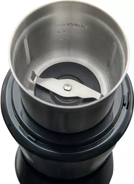 Inside of a coffee grinder with blade and metal container.