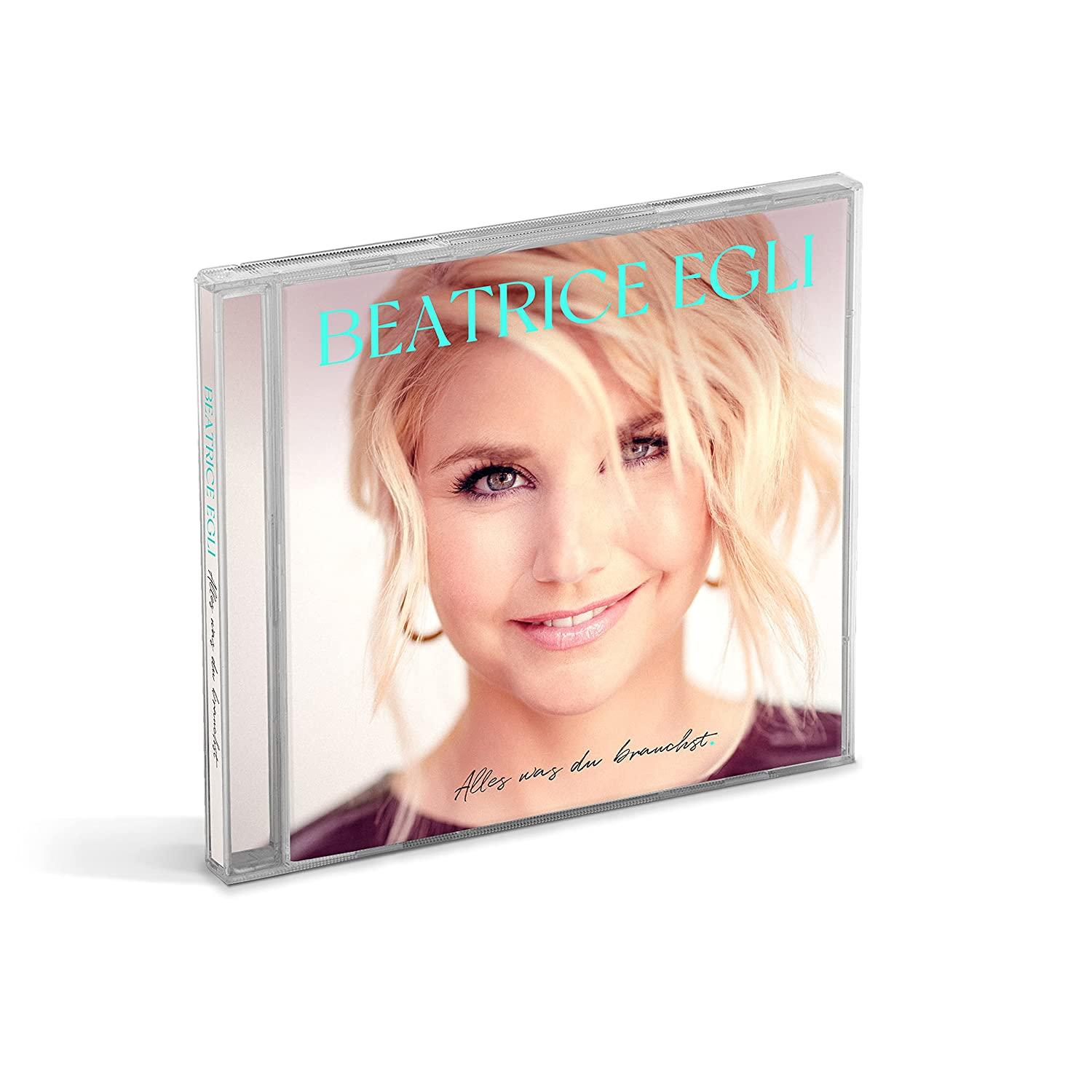 CD-Cover mit lächelnder blonden Frau, Text "Beatrice Egli" und Albumtitel "Alles was du brauchst".