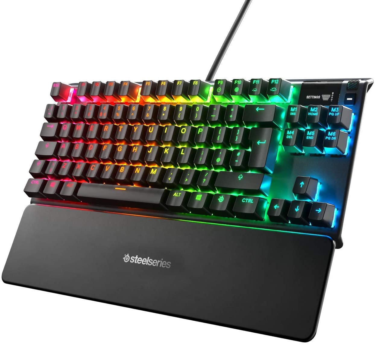 Çok renkli tuşlara ve siyah bilek desteğine sahip siyah mekanik klavye. Steelseries markası.