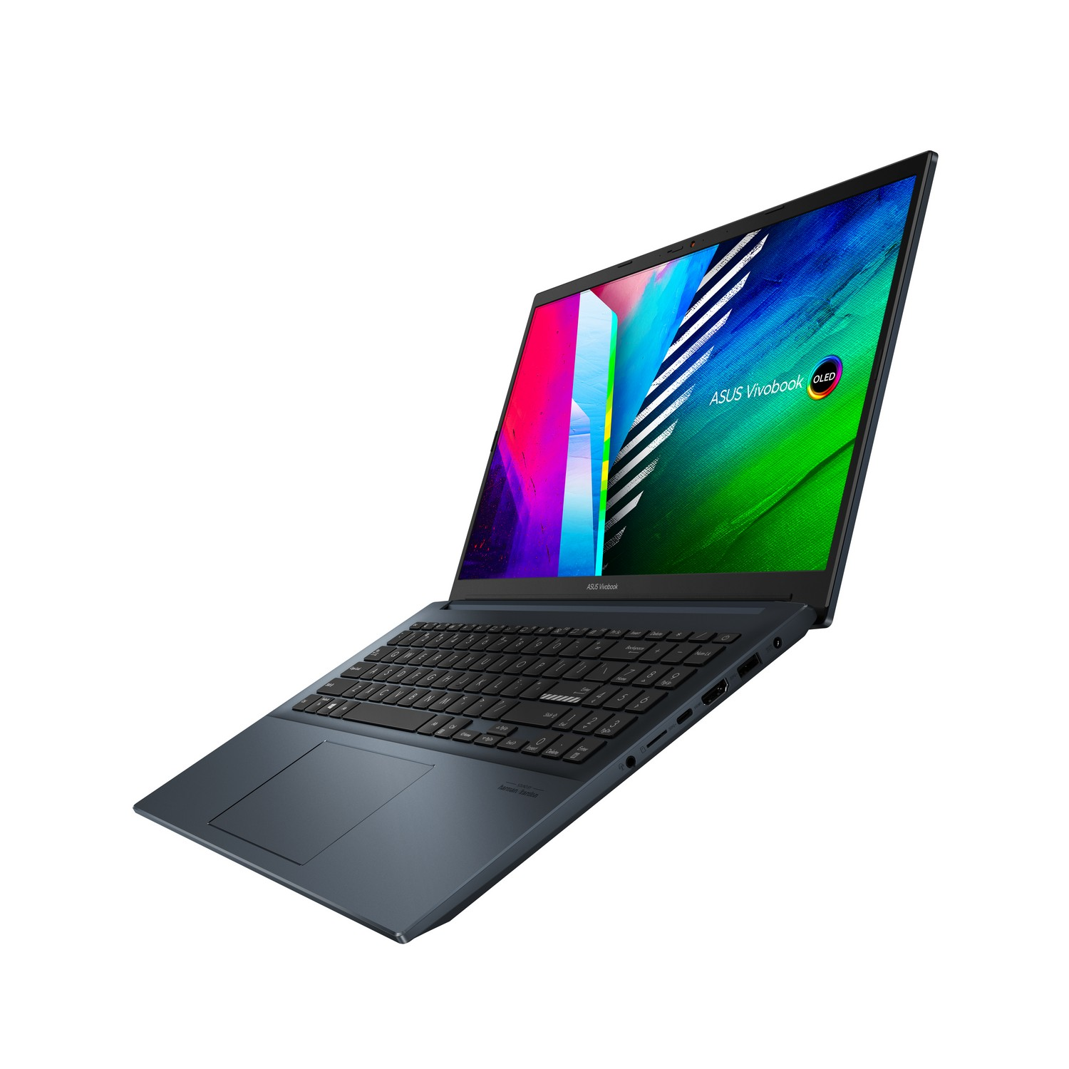 Ordenador portátil azul sobre fondo blanco. La pantalla muestra una imagen abstracta colorida y el logo ASUS.