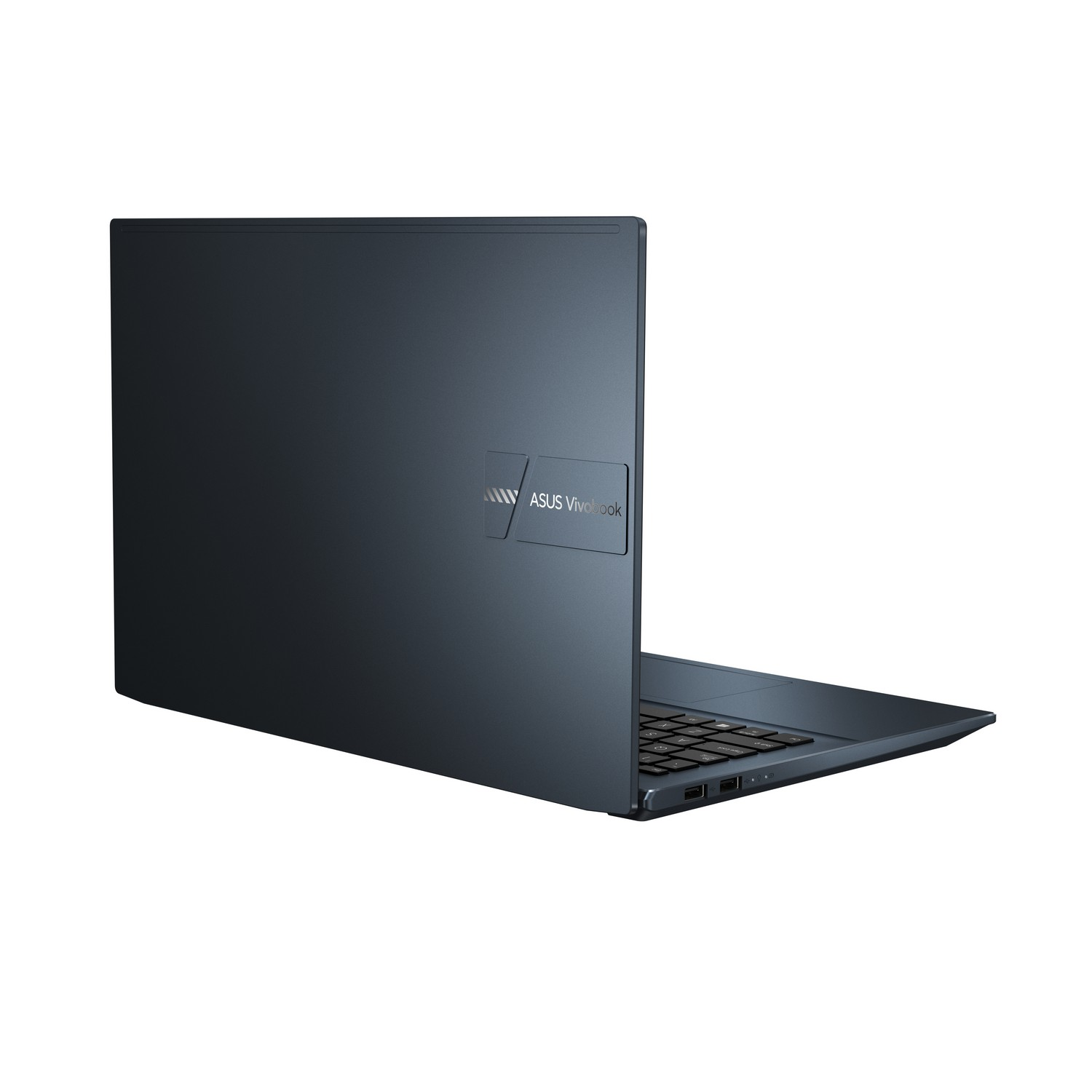 Portátil ASUS Vivobook azul-gris, parcialmente abierto, mostrando teclado, fondo blanco.