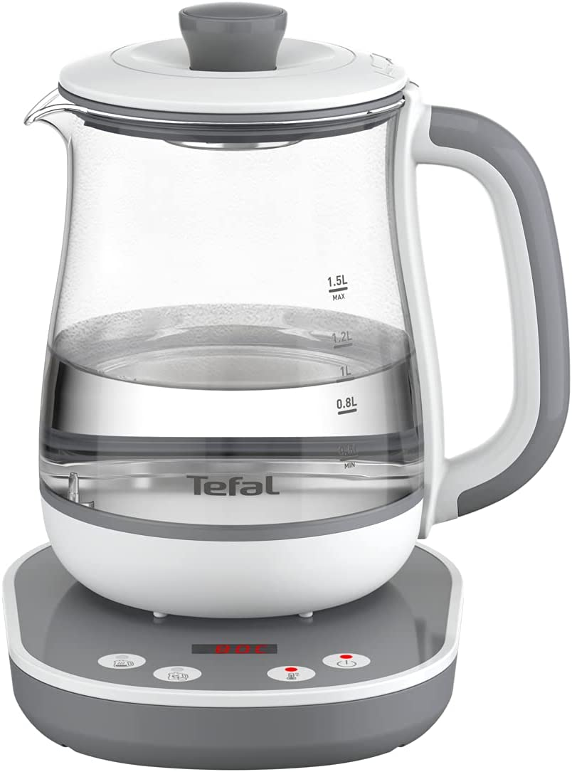 Glass kettle with water inside, on a white and gray base.