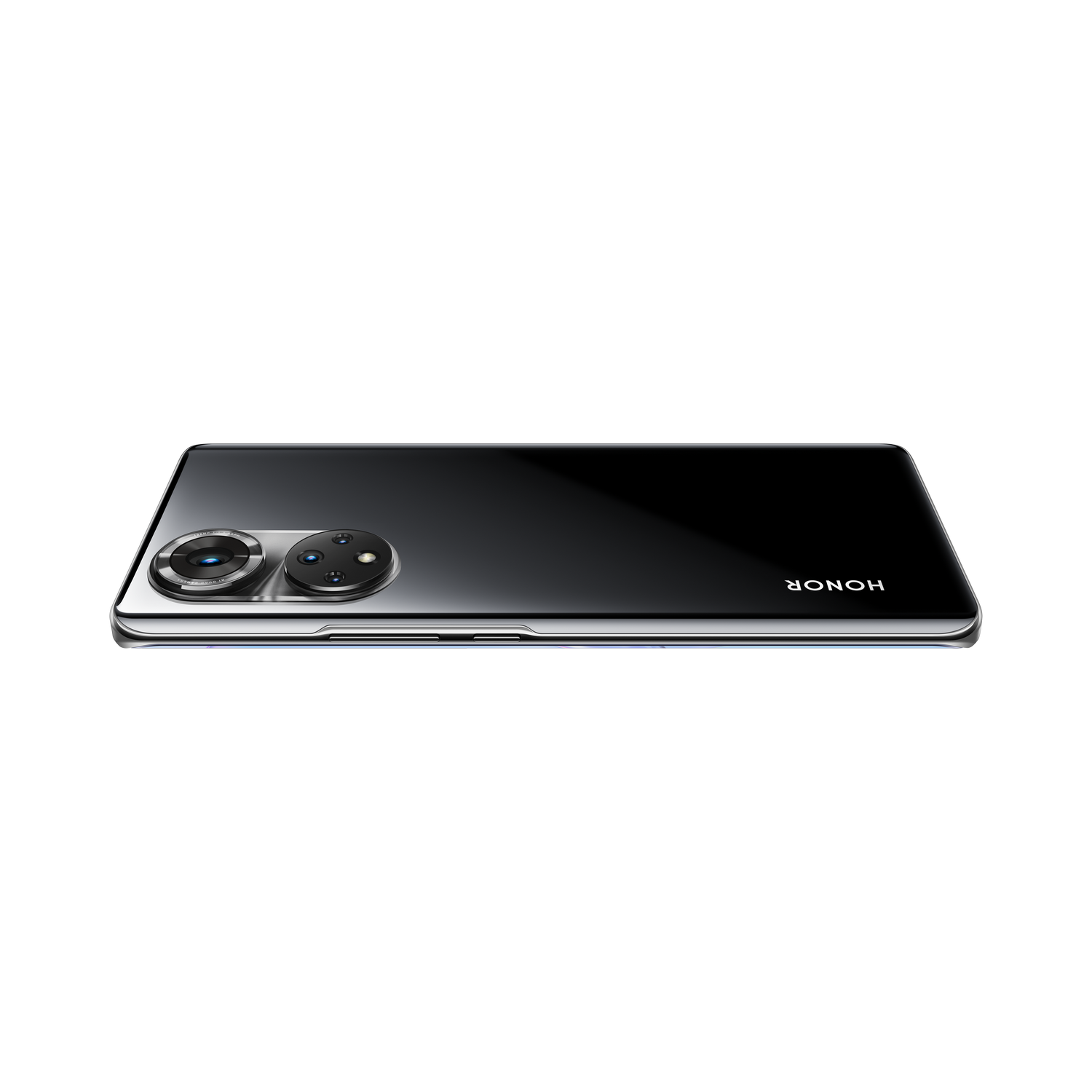 Un teléfono negro sobre una superficie negra con la palabra HONOR en la parte posterior.