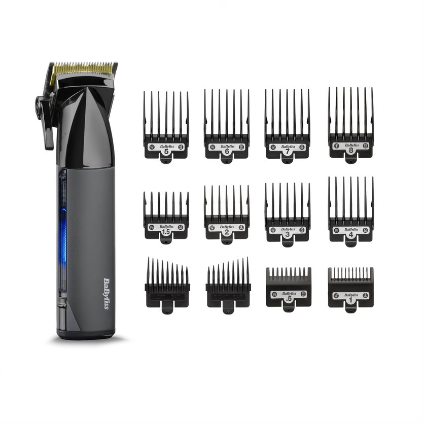Black and gray hair clippers with multiple guide combs.