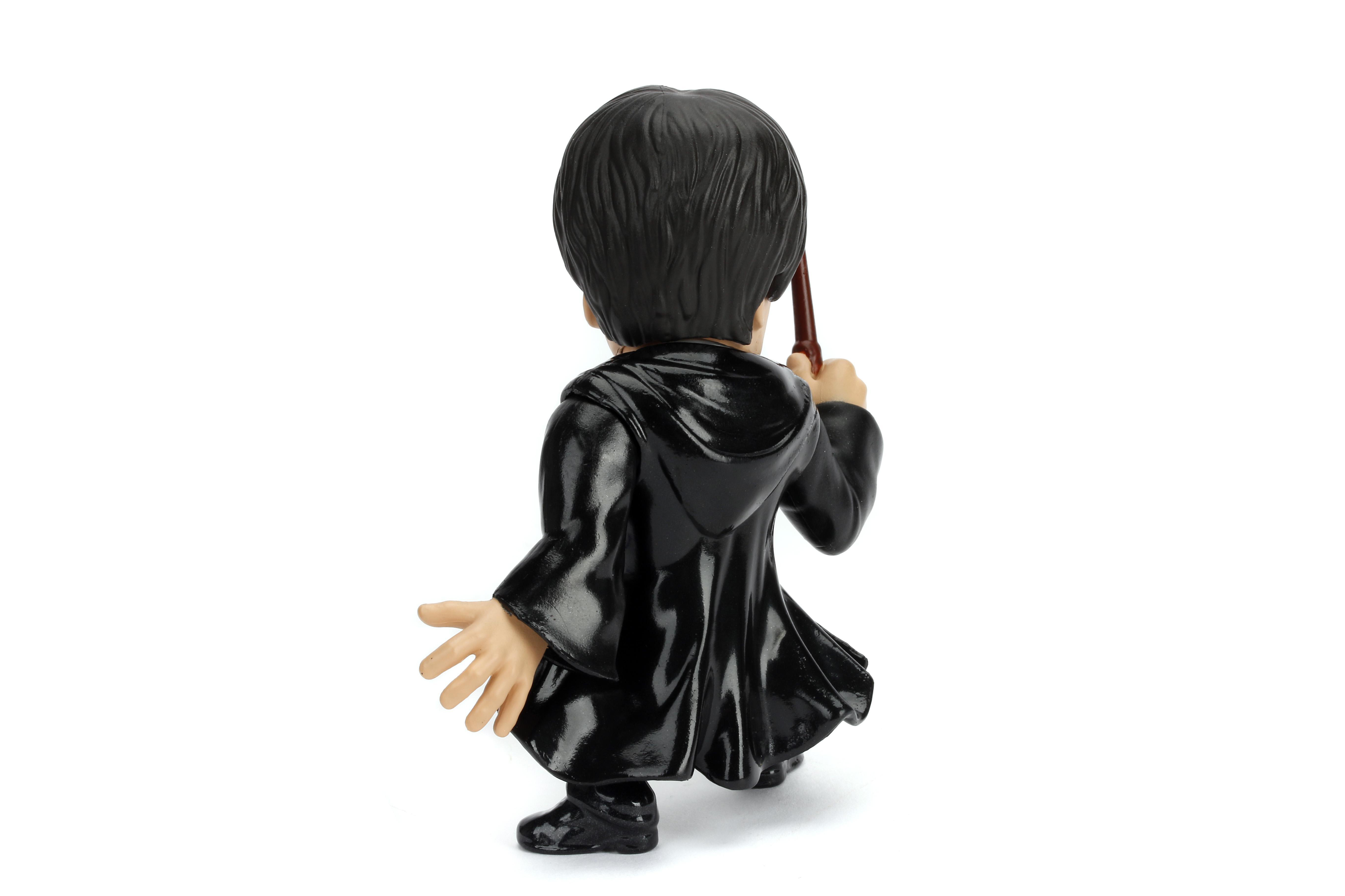 Eine Harry-Potter-Figur. Zeigt die Rückseite von Harry mit einem Zauberstab. Weißer Hintergrund.