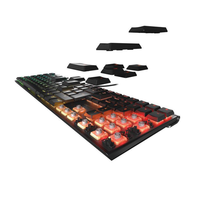 Mechanische Tastatur mit beleuchteten Tasten und zusätzlichen Tastenkappen auf weißer Oberfläche.