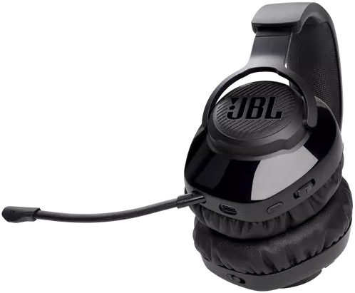 Black JBL gaming headset with a microphone on a black background.