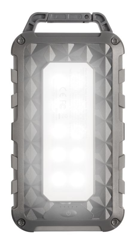 Ein graues, robustes, rechteckiges Licht. Es hat einen Griff, eine Lichtplatte und einen Ein/Aus-Knopf.