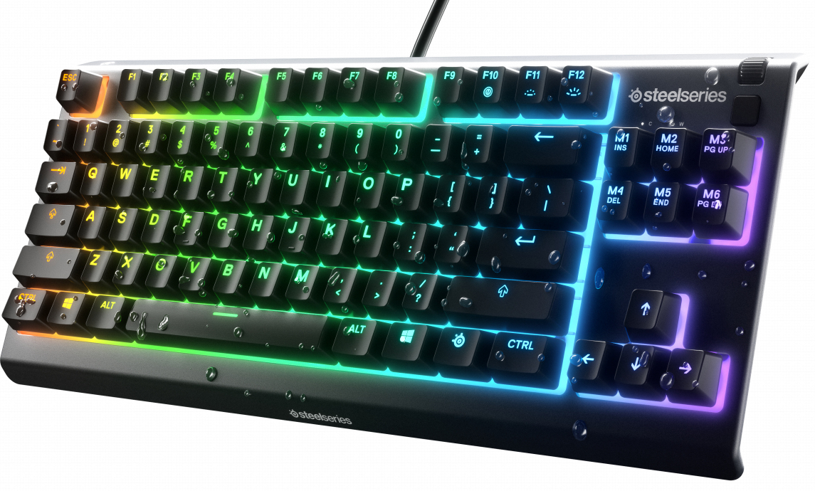 Illuminated keyboard with rainbow lights on white background.