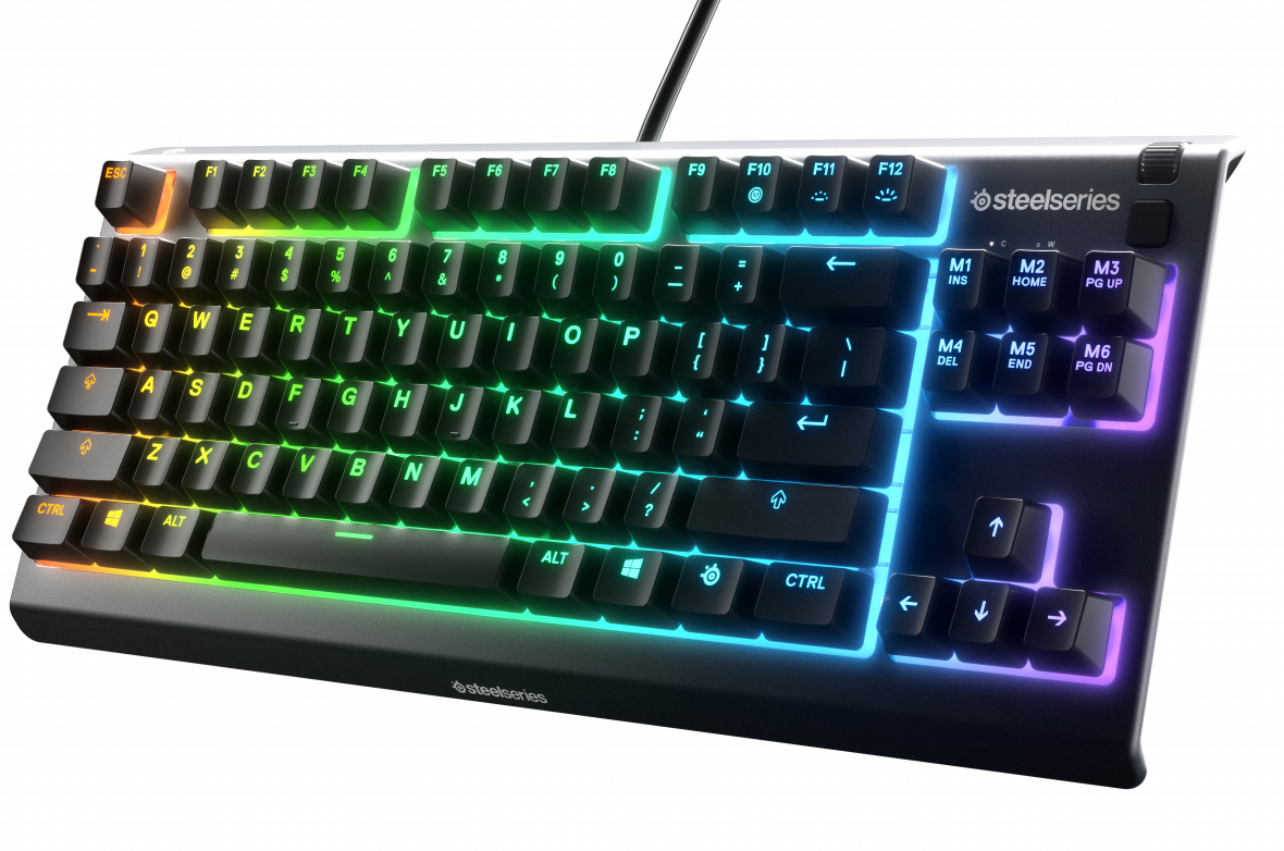 Black keyboard with rainbow lighting. SteelSeries logo. White background.