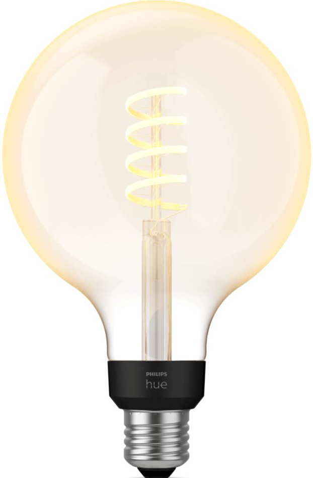 Una lampadina intelligente Philips Hue con un globo trasparente e un filamento a spirale.