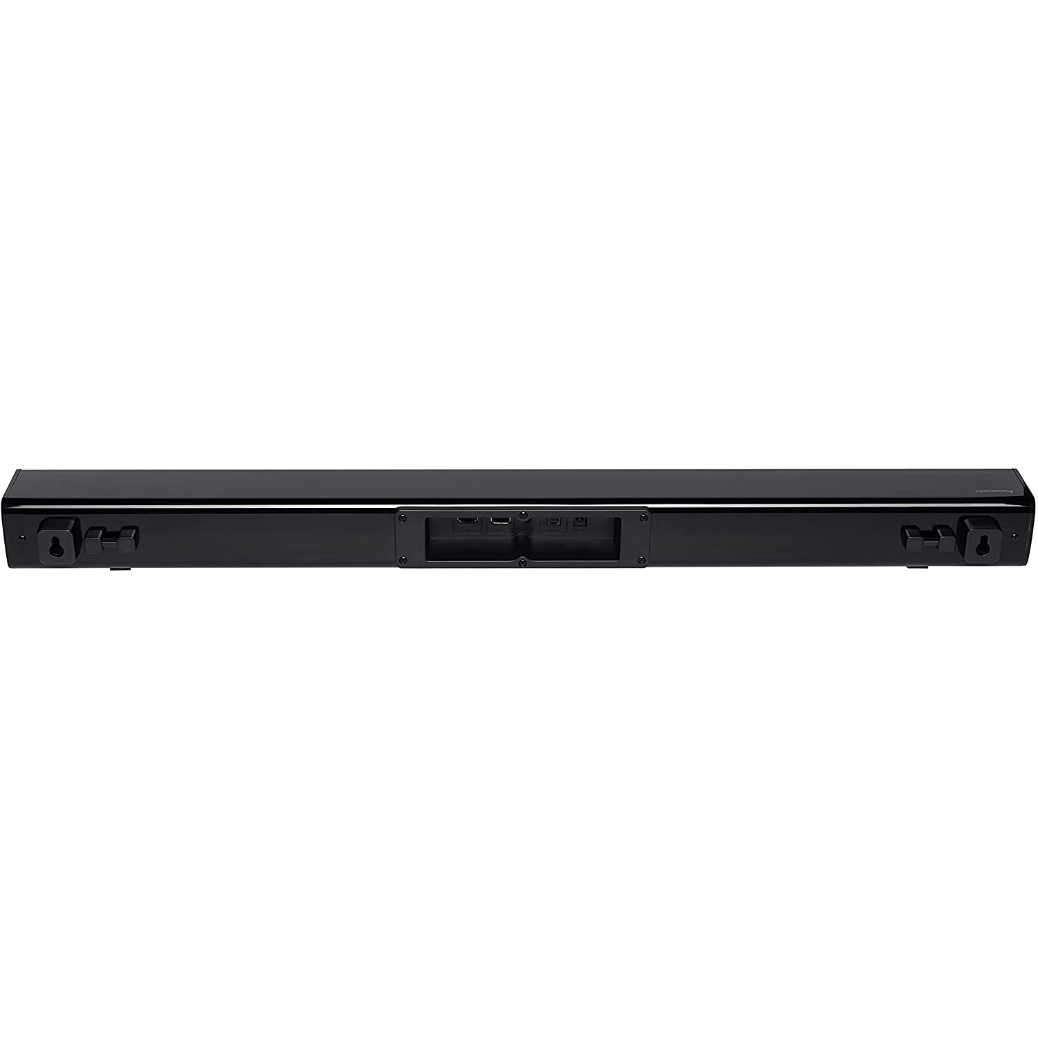 Barra de sonido negra con puertos de entrada en la parte trasera. Forma rectangular larga. Negro.