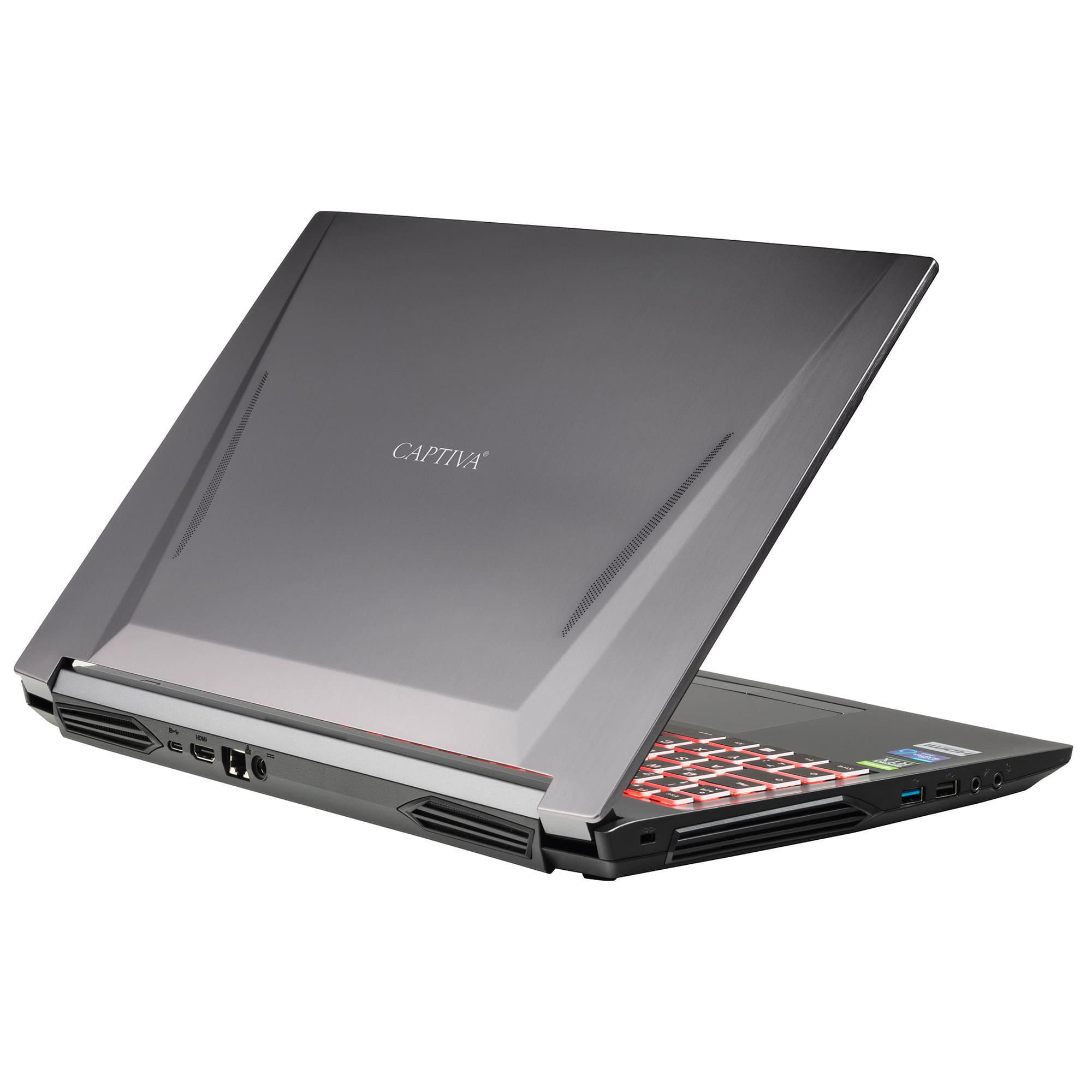 Grauer Laptop auf einem Schreibtisch, angewinkelt, um die Ober- und Seitenansicht zu zeigen.
