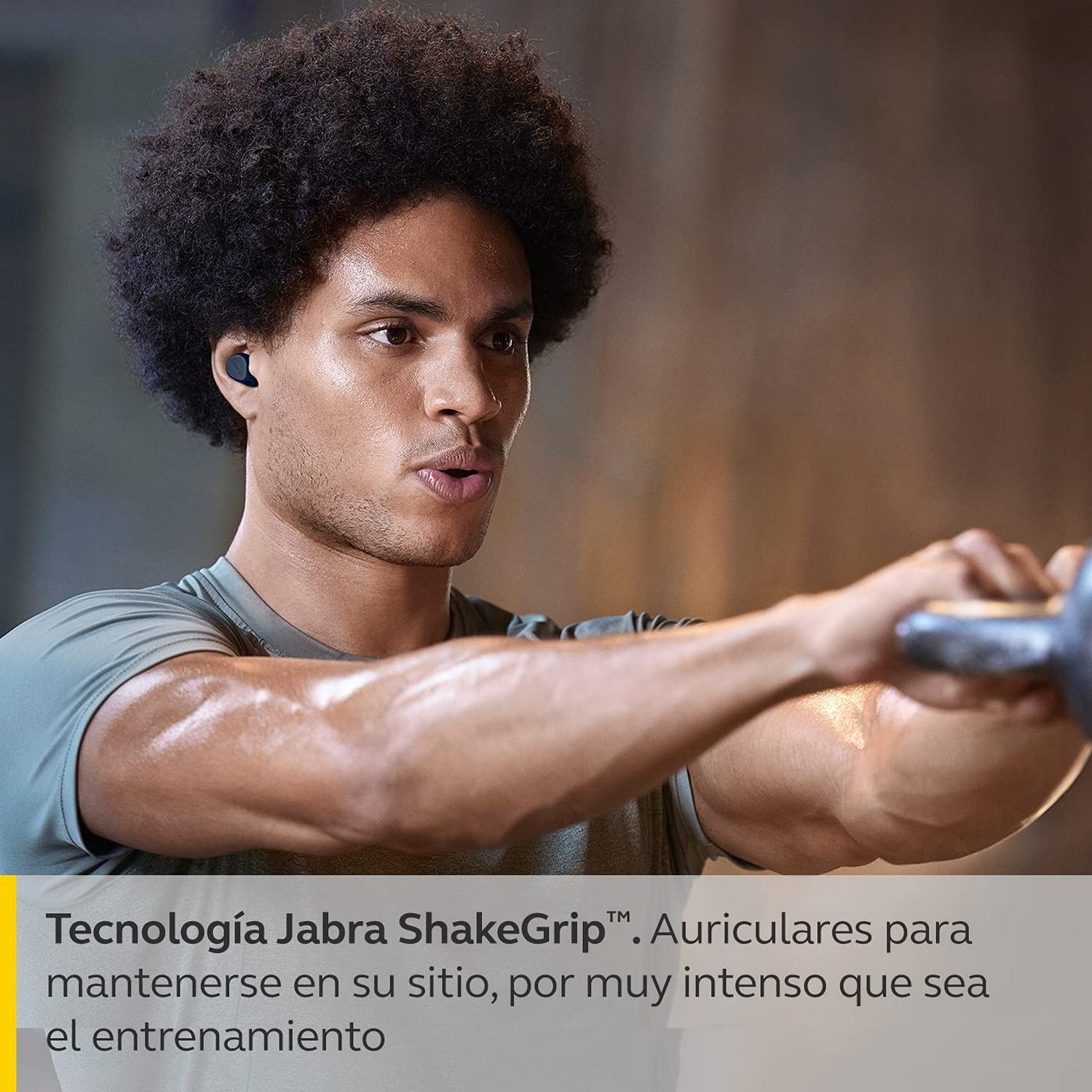 Hombre con auriculares haciendo ejercicio. Texto: Jabra ShakeGrip, auriculares para entrenar.