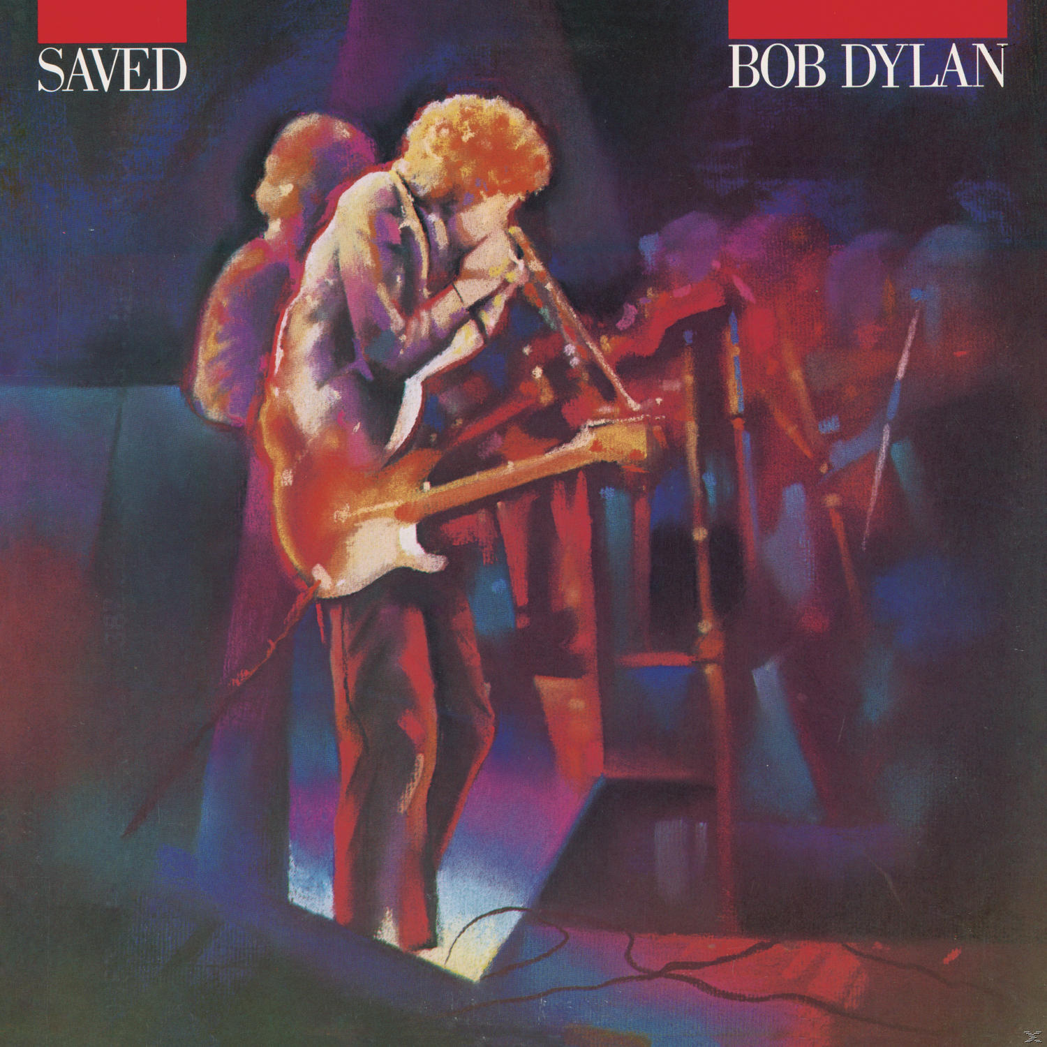 Album borító Bob Dylan-nel gitárral és zenekarral. A 'SAVED' és a 'BOB DYLAN' szavak láthatók.