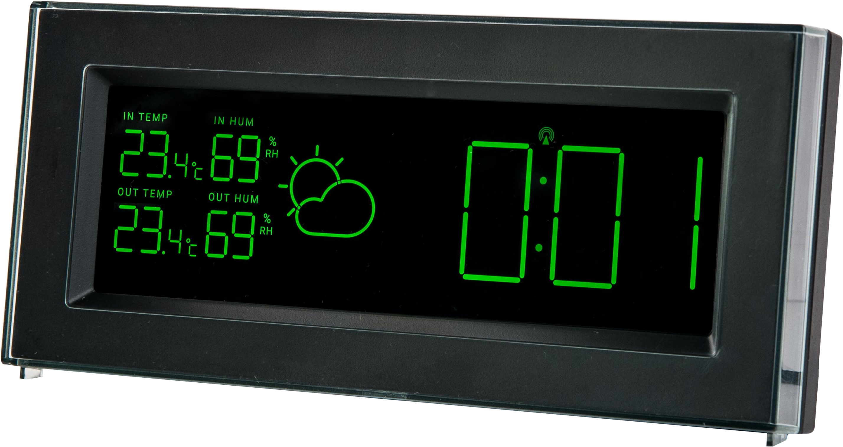 Horloge numérique avec chiffres verts sur un cadre noir affichant l'heure, la température et l'humidité.