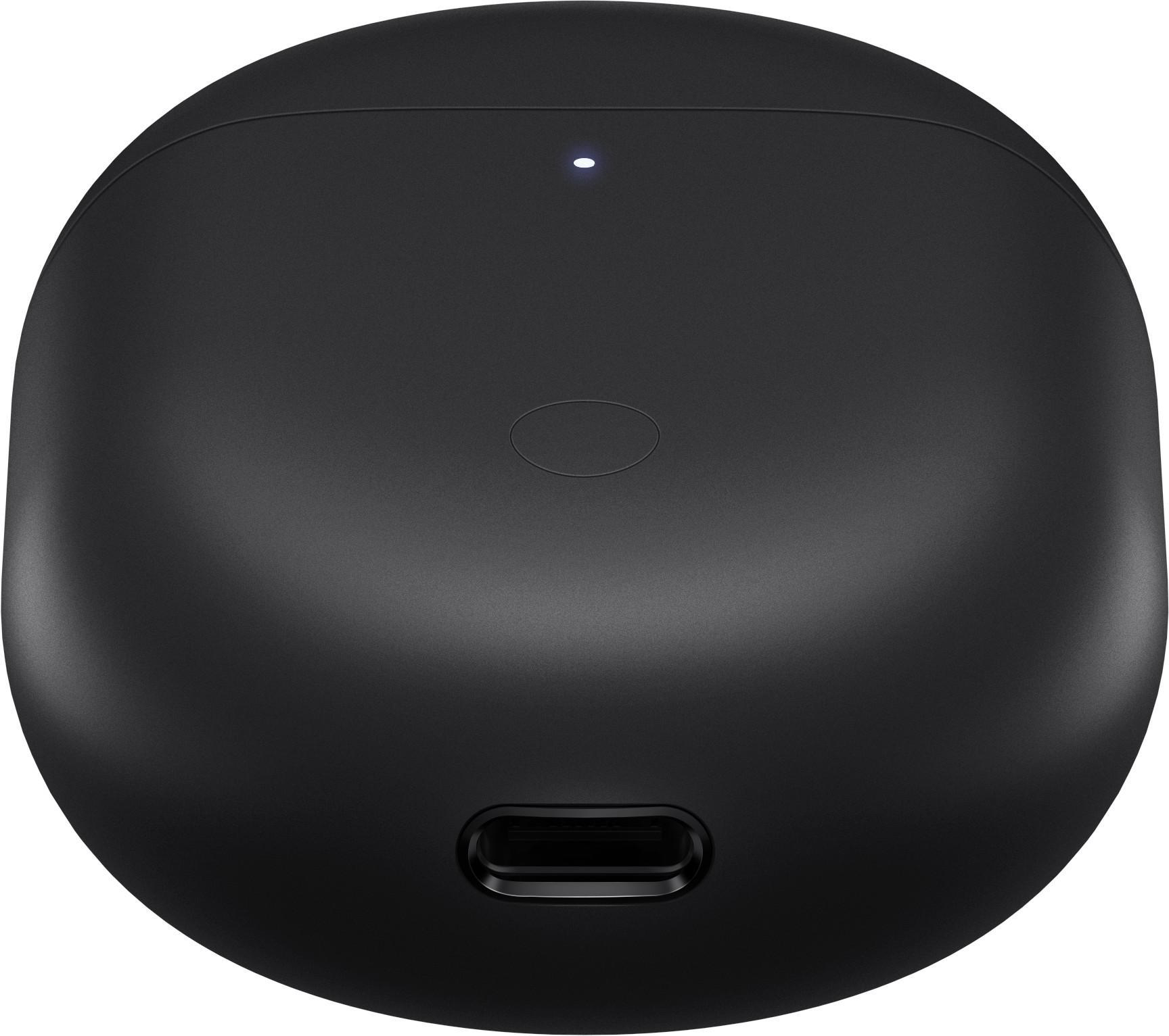 Ein schwarzes Ladecase für Ohrhörer mit Ladeanschluss und einer Kontrollleuchte oben.