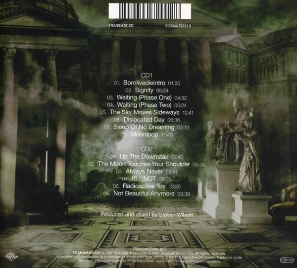 Die Rückseite einer CD mit Songtiteln, einer Statue und einem Gebäude auf dunklem Hintergrund.