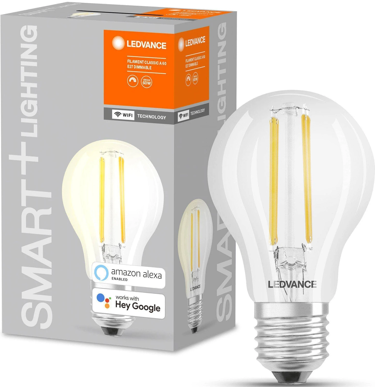 Ampoule d'éclairage intelligent Ledvance dans une boîte, à côté de l'ampoule. Ampoule transparente avec filaments jaunes.