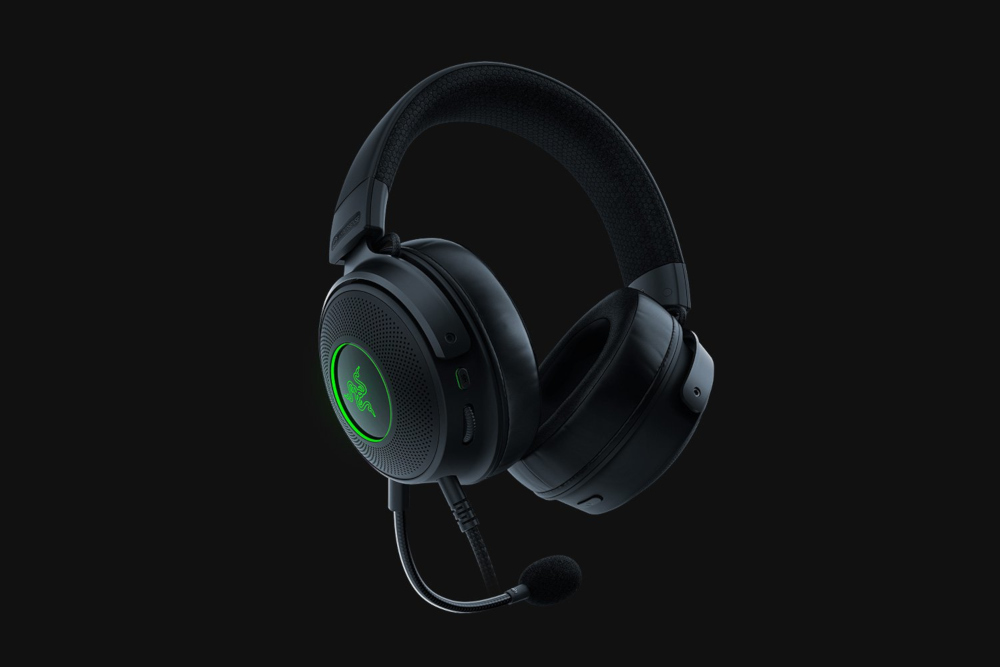 Zwarte Razer gaming headset met groene accenten. Het heeft een microfoon en zachte oorschelpen.