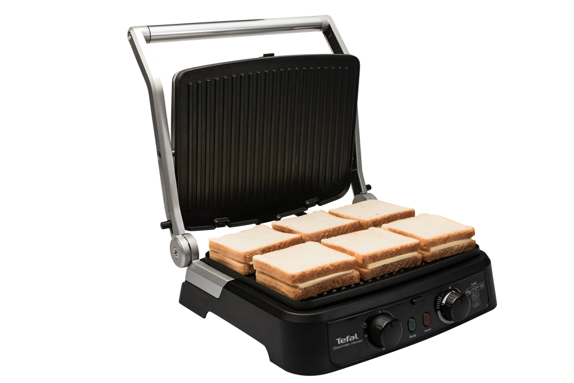 Tefal Gourmet tost makinesi, ızgarada tostlar ve kızarmaya hazır.