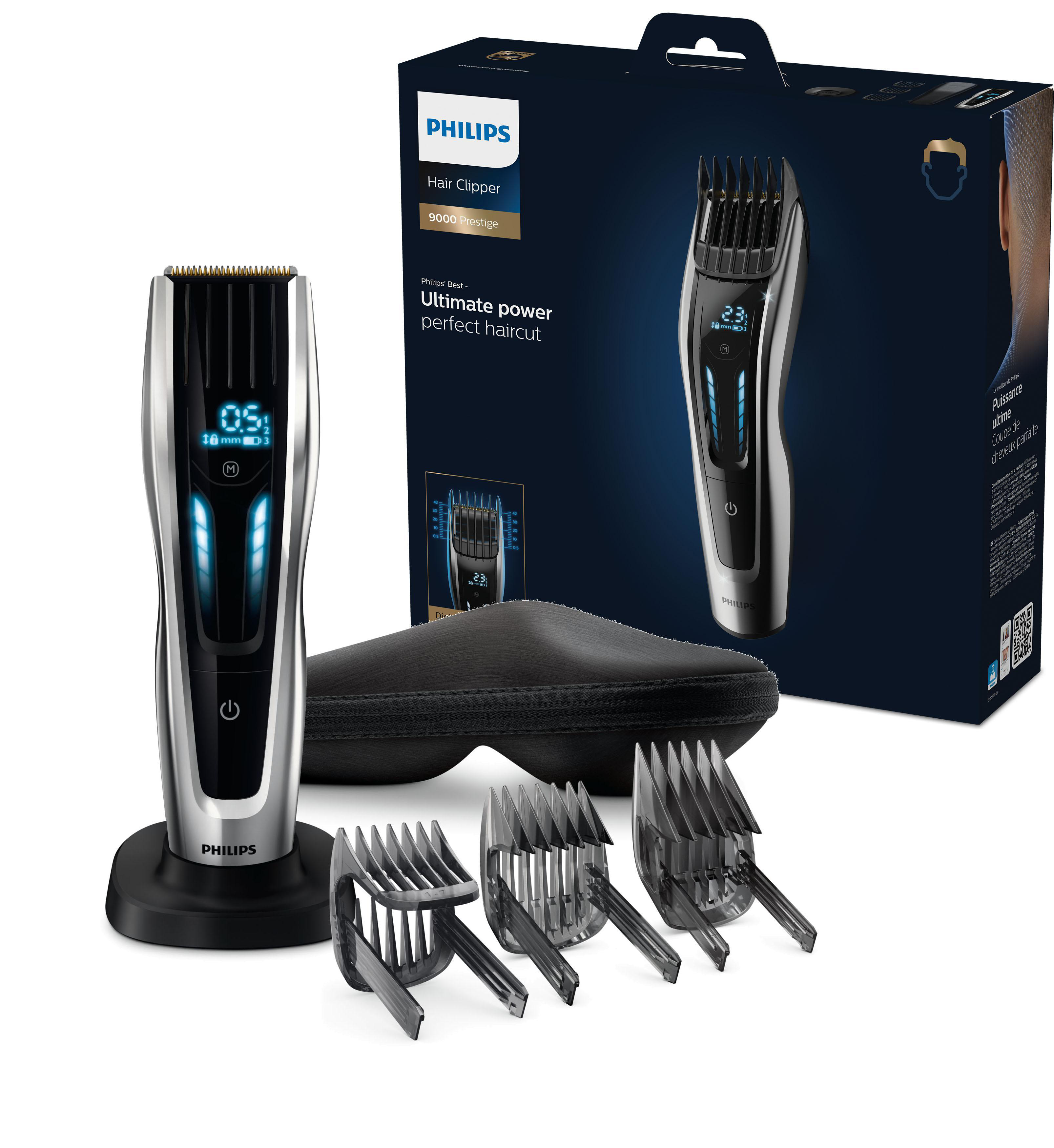 Ein schwarzer Philips Haarschneider mit Aufsätzen und einer Tragetasche. Ein digitales Display ist sichtbar.