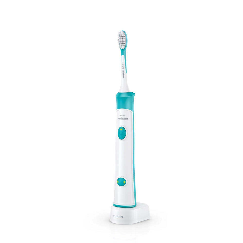 Une brosse à dents électrique Philips Sonicare, blanche et sarcelle, sur une base de chargement. La tête de brosse est visible.
