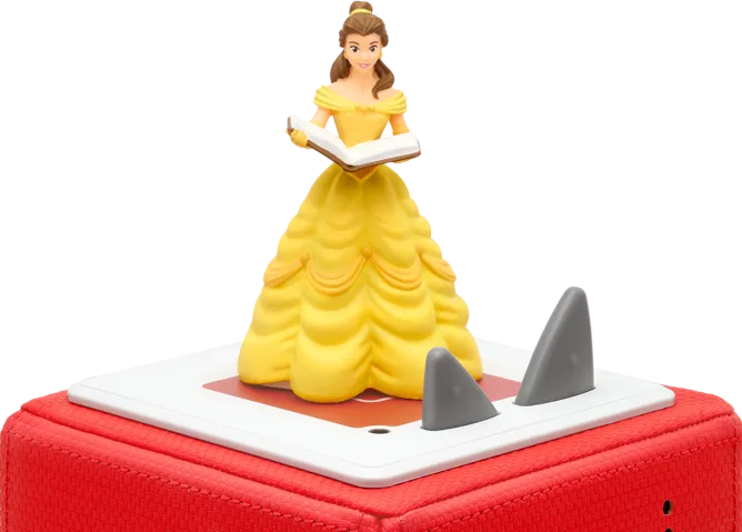 Belle-Figur auf roter Basis mit 3 Haifischflossen. Sie hält ein Buch.