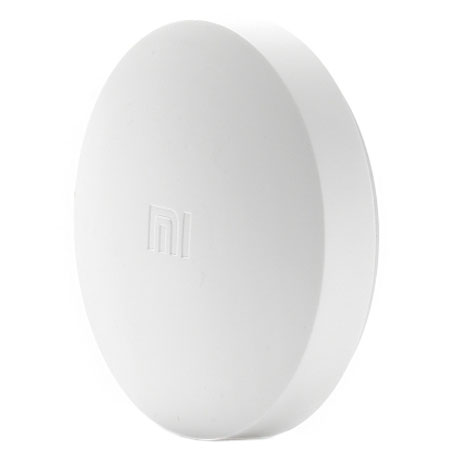 Ein weißes, kreisförmiges Gerät mit dem 'MI'-Logo, wahrscheinlich ein Smart-Home-Produkt.
