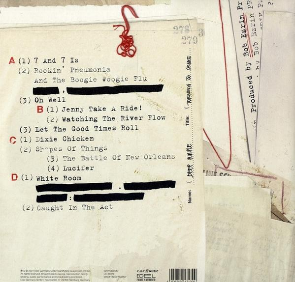 Pochette d'album avec texte et notes manuscrites.