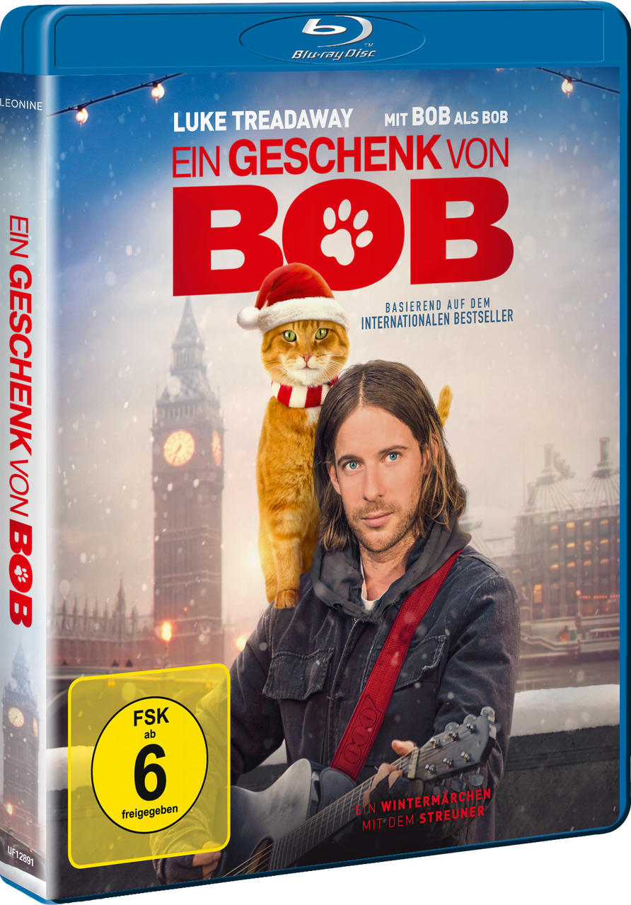 Filmcover von 'A Gift from Bob' mit einem Mann und einer Katze mit Weihnachtsmütze.